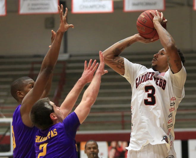 Ben Earp / The Star

GWU senior Tashan Newsome lets a jump shot fly against the Tennessee Tech defense Saturday night at Paul Porter Arena. Newsome scored 27 points and pulled down eight rebounds to lead the Runnin' Bulldogs to a 20-point victory.