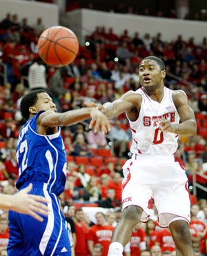N.C. State coach Mark Gottfried says he wants freshman guard Rodney Purvis, right, more involved offensively.