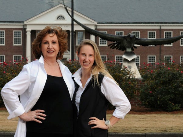 Mother and daughter Patrice (left) and Victoria Willetts stand in front of Hoggard Hall on the campus of University of North Carolina Wilmington Friday, Dec. 7, 2012.