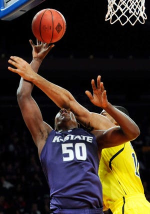 D.J. Johnson, left, and Kansas State, here playing against then-No. 4 Michigan and Jon Horford in New York, will travel to play No. 14 Gonzaga on Saturday in Seattle.