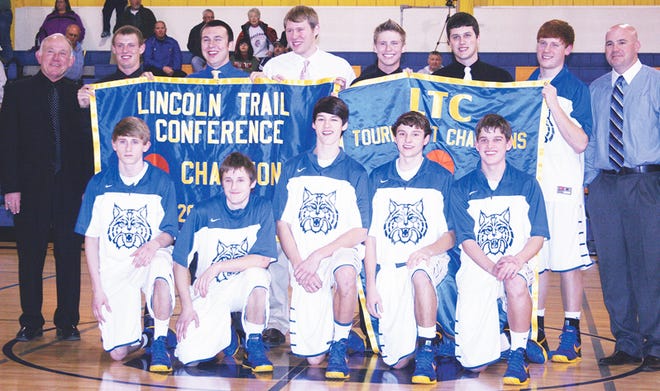 The Galva Athletic Boosters presented members of the 2011-12 boys basketball team with banners commemorating its Lincoln Trail Conference regular-season and tournament championships Tuesday night. Team members are, front from left, Dexter Ingels, Miles Hardy, Reece Hoxworth, David Jeffries and Caleb Rux. Back row, assistant coach Pup Dennison, Jacob Warner, Brady Landis, Kile Mott, Austin Ingels, Sean VanDeVelde, Conner King and head coach Chance Jones. Team members absent were Dustin Jacobson, Brad Moehring and River Aguirre.