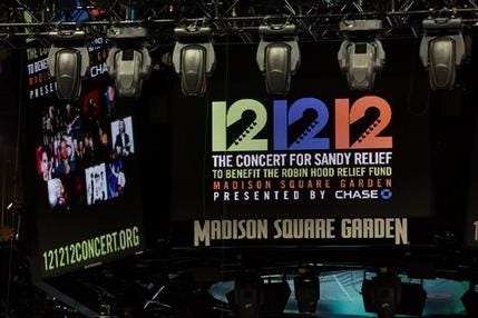 Signage for the "12-12-12" concert is displayed on the Madison Square Garden jumbotron, Tuesday, Dec. 11, 2012, in New York. The Dec. 12 concert, whose proceeds will aid victims of Superstorm Sandy, will feature artists Bon Jovi, Eric Clapton, Dave Grohl, Billy Joel, Alicia Keys, Chris Martin, The Rolling Stones, Bruce Springsteen & the E Street Band, Eddie Vedder, Roger Waters, Kanye West, The Who and Paul McCartney.