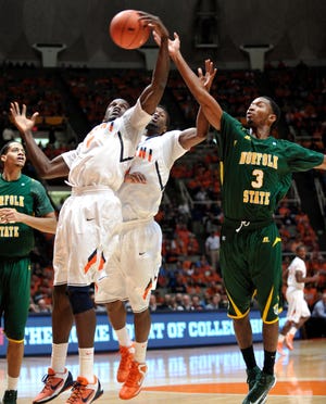 Illinois' Sam McLaurin (0) grabs a rebound in front of D.J. Richardson (1) and Norfolk State's Jamel Fuentes (3) in the first half of an NCAA college basketball game at Assembly Hall in Champaign, Ill., Tuesday Dec. 11, 2012. (AP Photo/John Dixon)