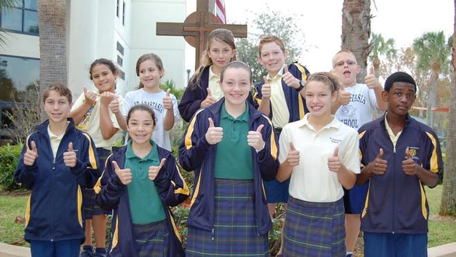 St. Anastasia Catholic School December Students of the Month are (front, from left) Kristopher Lippard, Jessica Goldstein, Jenna Cognetta, Gabriela Leonor and Darrell Decius; (back, from left) Casey Rodriguez, Bella Russman, Emily Noelke, Brandon Jones and Bryce Shevak.