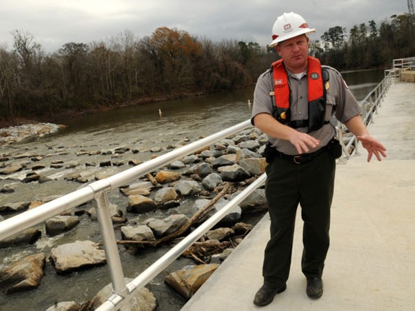 Park Ranger Tom Charles talks about the fish passageway the Army Corps of Enigineers recently completed at Lock and Dam No. 1 along the Cape Fear River on Tuesday, Dec. 11, 2012, in Bladen County.