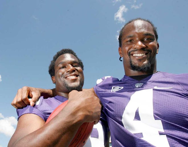 Kansas State's Arthur Brown, right, was named to the first-team All-America squad selected by the Football Writers Association of America.