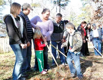 From left, Brooke Essary,, Harvey Essary, Rebecca Essary, Bethany Essary and Nathaniel Essary during the 88th Habitat Home Groundbreaking Ceremony on Quail Point Drive in Hubert Friday.