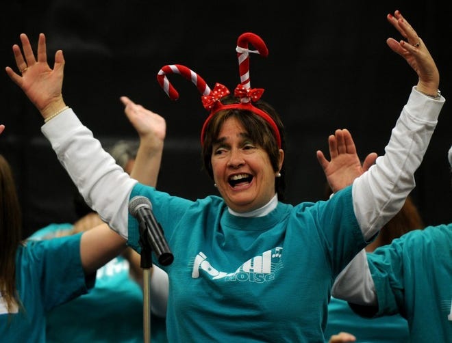 Lisa Fay of Voorhees, New Jersey, and a member of the Joyful Noise choir sings "Let it Snow" during a holiday concert at the Special Services School in Westampton on Friday morning. The choir is part of the Bancroft Neuro Health Services outreach program. Joyful Noise is made up of mentally handicapped residents that range from 17 to 70 years of age.