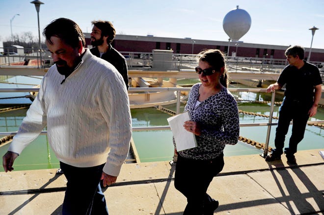 Amy Bremer, who has pressed the city to study the use of fluoride in drinking water, follows Columbia City Manager Mike Matthes on Nov. 30 on a tour of Columbia’s water treatment plant in an effort to learn about its handling and use of hydrofluorosilicic acid.