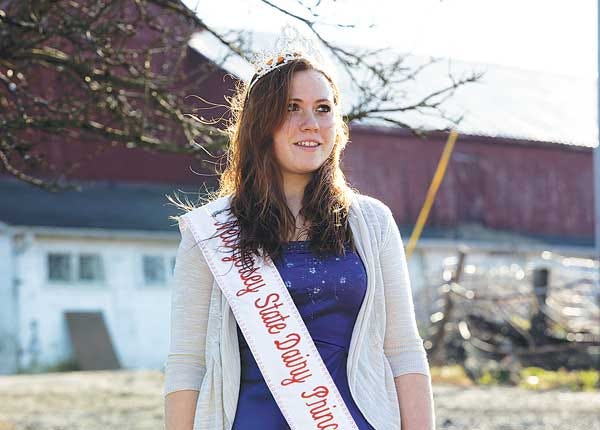 Photo by Tracy Klimek/New Jersey Herald - Kayla Vaughan, 17, stands on her farm in Lafayette wearing a tiara and sash. Vaughan, a senior at Sussex County Technical School, is the 2012-13 New Jersey State Dairy Princess.