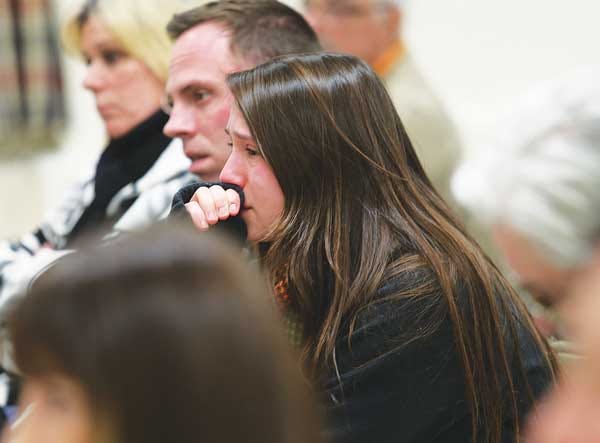 PHoto by Daniel Freel / New Jersey Herald — Photo by Daniel Freel/New Jersey Herald_ Samantha Stefanik, of Hampton, holds back tears at a Stillwater Township Zoning Board meeting at the Stillwater Township School Monday .