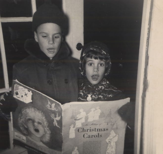 Steve and Sue Scheible sing Christmas carols in the late 1940s.