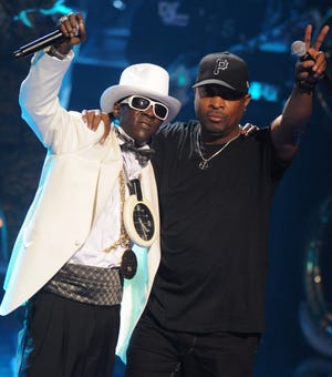 Rappers Flavor Flav, left, and Chuck D of Public Enemy, performing in 2009.