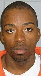 This undated photo provided by the FBI shows Jose Banks, one of two inmates who escaped from the Metropolitan Correctional Center in downtown Chicago Tuesday, Dec. 18, 2012. Chicago Police Sgt. Michael Lazarro says their disappearance was discovered at about 8:45 Tuesday morning. Lazarro says the pair used a rope or bed sheets to climb from the building. (AP Photo/FBI,HONS