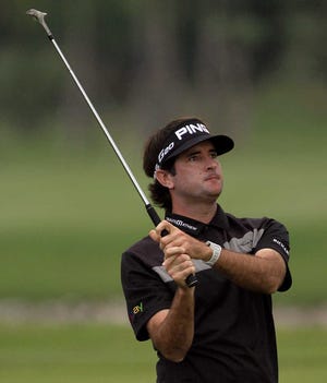 Bubba Watson of the U.S. plays a shot on fairway during the final round of the Thailand Golf Championship at the Amata Spring Country Club in Chonburi province, southeastern Thailand Sunday, Dec. 9, 2012. (AP Photo/Sakchai Lalit)