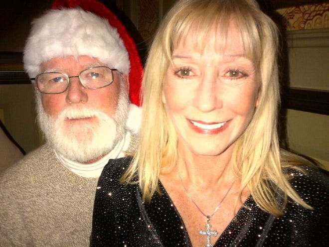 Greig and Sandy Buckley get into the Christmas spirit prior to the Sinfonia Broadway Christmas concert Dec. 14.