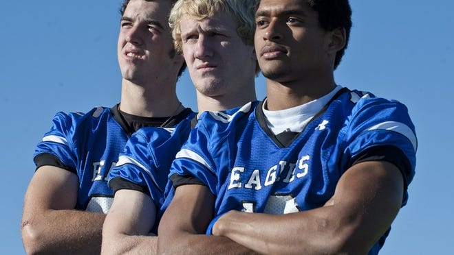 Georgetown’s receiving corps includes, from left to right, seniors Noah Douglas, Ryan Bedford and Randy Knightner. The trio has combined for 32 touchdown passes this season to help the Eagles reach the Class 4A, Division I final.