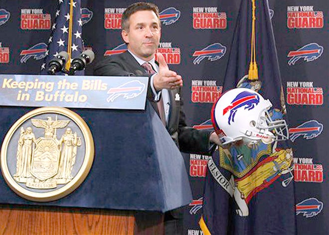Buffalo Bills CEO Russ Brandon gestures during a news conference Friday announcing details of a 10-year lease to keep the NFL football team in Orchard Park.