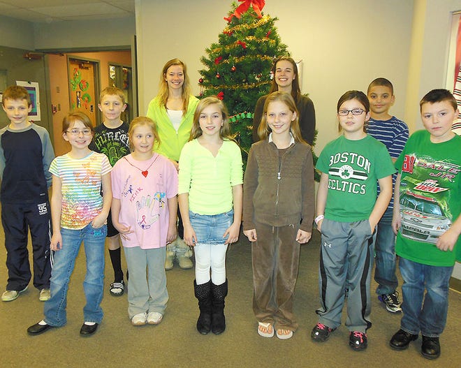 Students at West Canada Valley Central School have adopted an elementary school on Fire Island and are working to raise funds to help the families of students there who were affected by Hurricane Sandy. From left are, front, fourth graders Shannon Rider, Alyssa Gauthier, Brooke Cardinal, Jessica Lindsay, Maggie Burdick and Kile Wood; and, back, Andrew Soron and Jaeden Beam of WCV Elementary School; Kara Newman, cheerleader; MaryAnn Stockhauser, a member of the WCV Student Council and a cheerleader; and Ruben Gibson, elementary student.