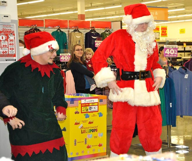 Santa and an elf broke out in dance Friday at Kmart.