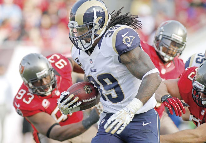 Reinhold Matay/Associated Press St. Louis Rams running back Steven Jackson (39) runs past Tampa Bay Buccaneers defensive tackle Gerald McCoy (93) during Sunday's game in Tampa, Fla.