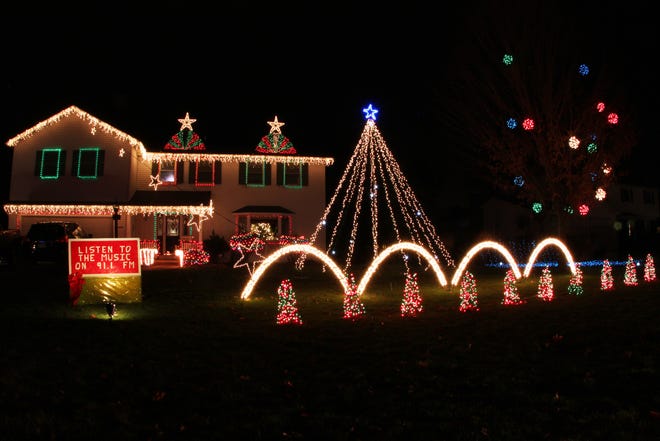 Bruce Raggi's light display at his 6221 Buckskin Drive home in Farmington has even begun to move into neighbors' yards.