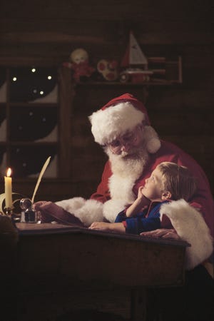 Little boy with Santa Claus