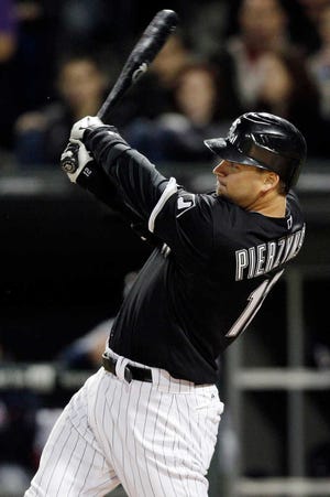 Catcher A.J. Pierzynski hit .278 with 27 home runs last season for the Chicago White Sox. The Texas Rangers announced they had signed Pierzynski to a one-year contract Wednesday.