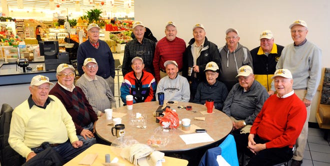A group of five University of Missouri athletic leaders began meeting for coffee each morning 50 years ago. One surviving member, Thornton Jenkins, is part of an evolving cast that still meets daily at the Hy-Vee on West Broadway. The group gathered for a photo Thursday wearing hats that read “Ole Tymers University.” In the front row are Don Walker, Jack Valentine, Ralph “Boot” Stewart, Jenkins, Hap Whitney, Johnnie Wayland, Charlie Robison and Bob Murrey. In the back row are Bill McGlasson, Jim Luetjen, Dean Baxter, Gene McArtor, Jim Chandler, George Blase and Jim Gebhardt.