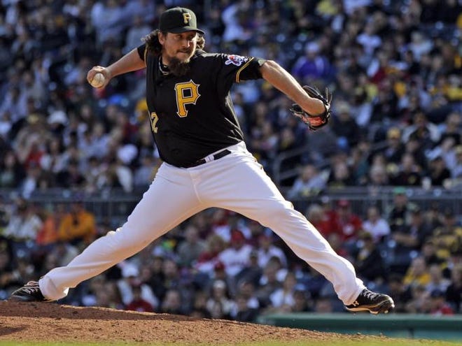 In this Sept. 30, 2012, file photo, Pittsburgh Pirates closer Joel Hanrahan delivers a pitch during the ninth inning against the Cincinnati Reds in Pittsburgh. The Red Sox have acquired the All-Star closer from the Pirates in a six-player deal trade on Wednesday, Dec. 26, 2012. The Red Sox also received infielder Brock Holt, but gave up right-handers Mark Melancon and Stolmy Pimentel, infielder Ivan DeJesus Jr. and first baseman-outfielder Jerry Sands.