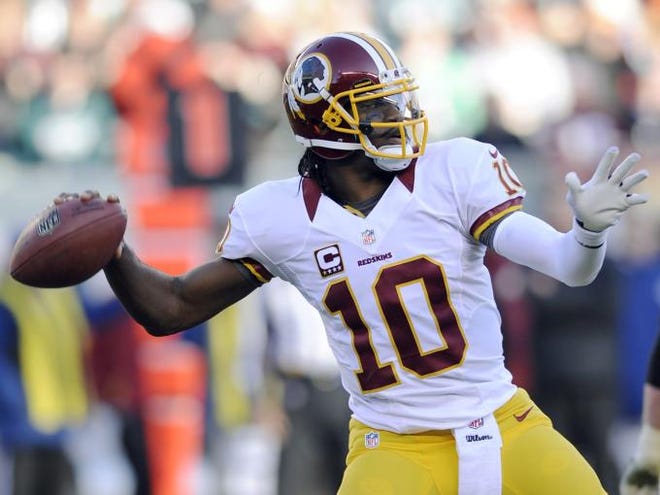 Washington Redskins' Robert Griffin III passes in the second half against the Philadelphia Eagles, Sunday, Dec. 23, 2012, in Philadelphia. Washington won 27-20.