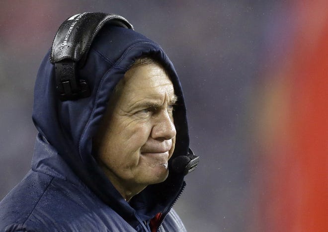 New England Patriots head coach Bill Belichick watches the action against the San Francisco 49ers in the third quarter of an NFL football game in Foxborough, Mass., Sunday, Dec. 16, 2012. ()
