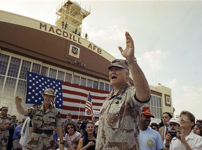 In this April 22, 1991 file photo, General H. Norman Schwarzkopf waves to the crowd after a military band played a song in his honor at welcome home ceremonies at MacDill Air Force Base in Tampa, Fla. Schwarzkopf died Thursday, Dec. 27, 2012 in Tampa, Fla. He was 78.