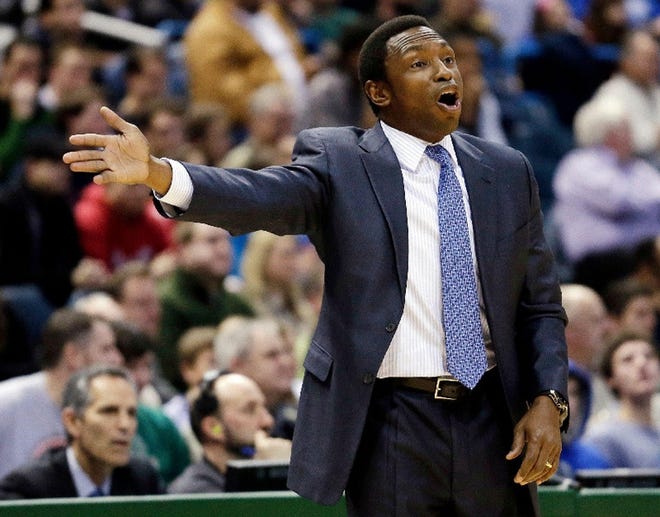 Brooklyn Nets head coach Avery Johnson reacts to a call during the first half of an NBA basketball game against the Milwaukee Bucks, Wednesday, Dec. 26, 2012, in Milwaukee. (AP Photo/Morry Gash)