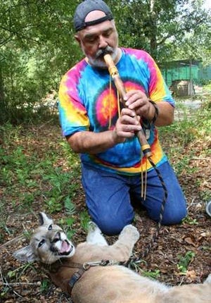 Paul McAuliffe, speaker at Sunday's UU meeting, says he loves to serenade the Florida Panthers, an endangered species. Contributed photo.