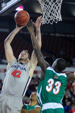 Forward Nemanja Djurisic (42) came off the bench for Georgia to score 21 points in the Bulldogs' win over Florida A&M on Saturday.
