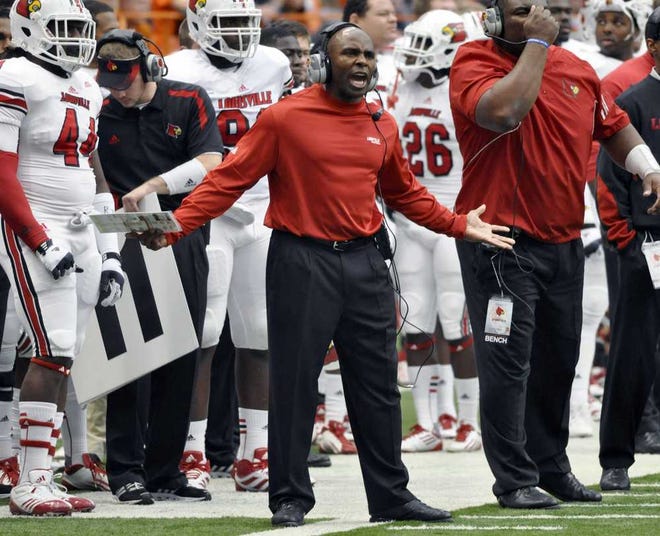 Kevin Rivoli Associated Press Louisville coach Charlie Strong speaks up on the sideline during the second quarter of game against Syracuse on Nov. 10. Louisville lost 45-26.
