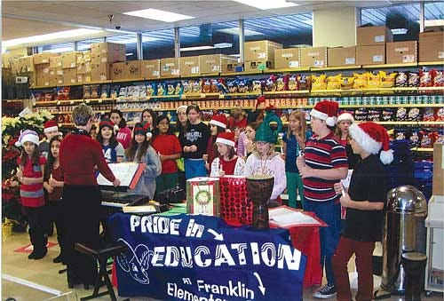 Christine Foster photo - Franklin Elementary School students entertain shoppers at the Franklin ShopRite.