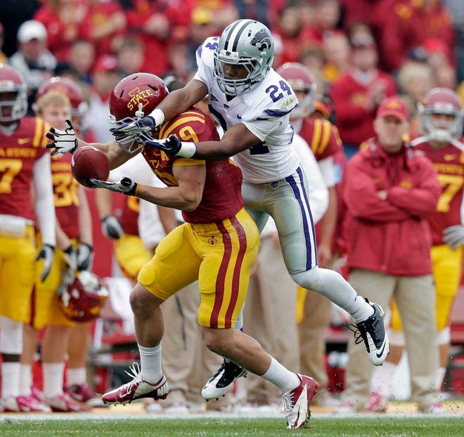 Kansas State cornerback Nigel Malone, breaking up a pass against Iowa State, says he has thrived in Manhattan as a junior college transfer.