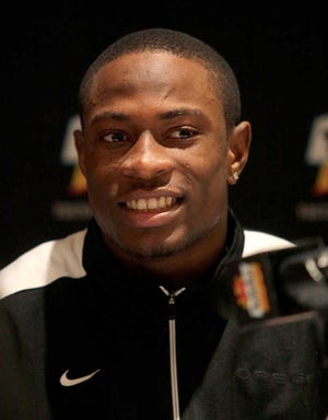 Oregon cornerback Ifo Ekpre-Olomu acknowledges the media during an NCAA college football news conference, Sunday, Dec. 30., in Scottsdale, Ariz. Oregon is scheduled to play Kansas State in the 2013 Fiesta Bowl on Jan. 3.