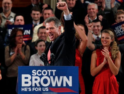 FILE - U.S. Sen. Scott Brown, R-Mass., pumps his fist during his re-election campaign kick-off in Worcester, Mass., in this Jan. 19, 2012 file photo. If Sen. John Kerry is confirmed by the Senate for secretary of state, as expected, Kerry would have to resign the seat he's held for nearly three decades, prompting a special election _ the state's third Senate contest since 2010. Already, jockeying is well under way. The big question is whether Republican Sen. Scott Brown will go for the seat, after losing his last month to Democratic challenger Elizabeth Warren.