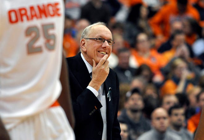 Syracuse head coach Jim Boeheim smiles late in the second half against Rutgers during an NCAA college basketball game in Syracuse, N.Y., Wednesday, Jan. 2, 2013. Syracuse won 78-53 for Boeheim's 903rd career victory passing Bobby Knight.
