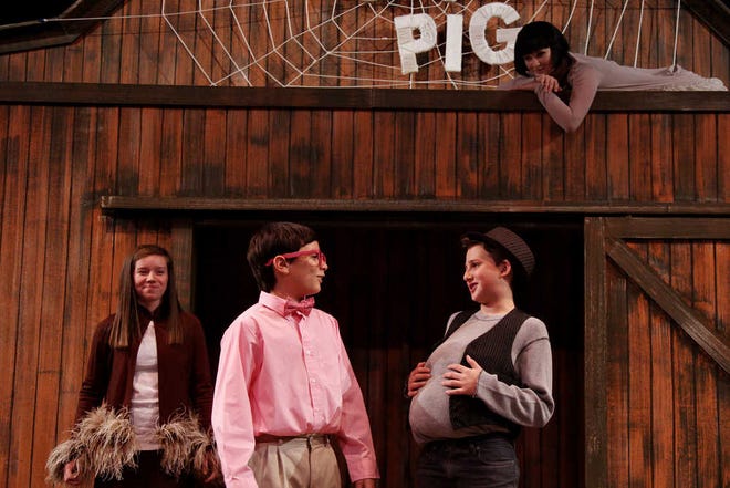 Jeff Heimsath / Amarillo Globe-News From left, Madeleine Neslen as Goose, Christian Hurd as Young Wilbur, Max Villyard as Templeton and Caitlin Izard as Charoltte rehearse scenes from Amarillo Little Theatre Academy's Charlotte's Web.