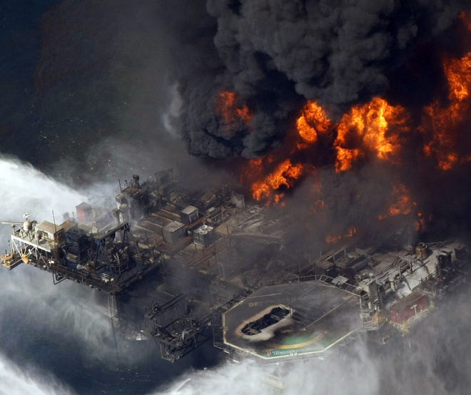 The Deepwater Horizon oil rig burns April 21, 2010, in the Gulf of Mexico. AP Archives Photo