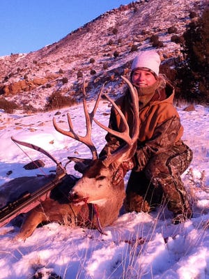 Kelly Newman of Edmond took this mule deer with a crossbow on New Year's Day morning near the Black Mesa in the Panhandle. About 250 mule deer are harvested in Oklahoma each season. They are mostly found in the Panhandle counties of Cimarron, Texas and Beaver and northwestern counties of Harper, Ellis, Woods and Woodward. Bow season for deer in Oklahoma continues through Jan. 15. PHOTO PROVIDED