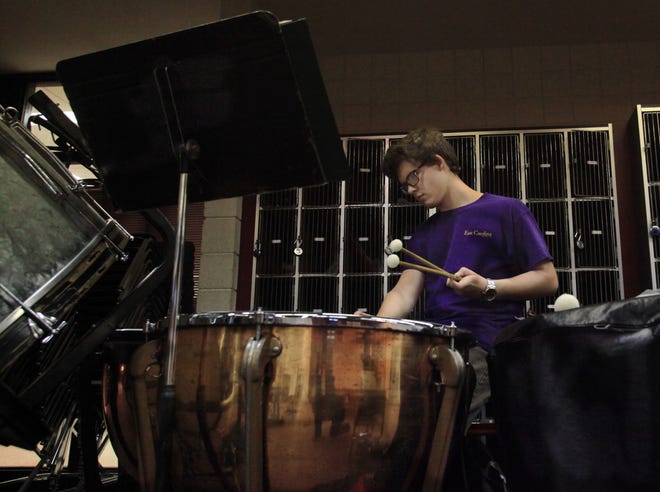 Band member and freshman Nicholas Scott practices on the timpani. The New Bern Band Club will be working to raise funds for new uniforms through 2013.