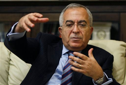 Palestinian Prime Minister Salam Fayyad blames Arab countries that haven't delivered promised financial aid for an escalating financial crisis in the Palestinian territories. Fayyad said Sunday that the cash crunch is pushing an additional 25 percent of the Palestinian population, or 1 million people, into poverty.