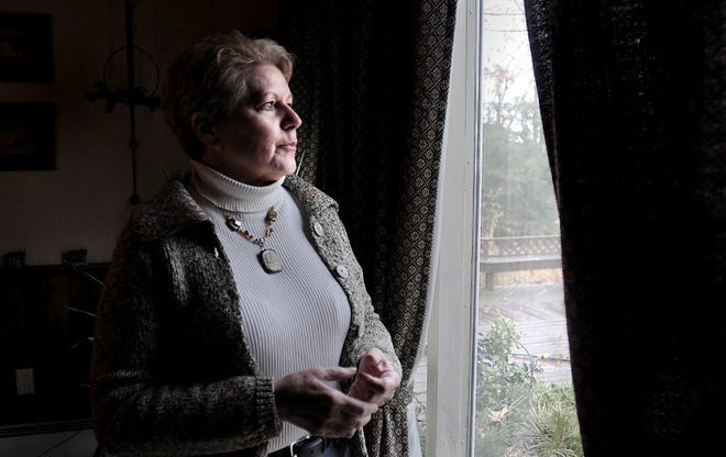Peg Haskell in her Tinicum Township home. She survived hurricane Sandy on the cheap without electricty for nearly a week.