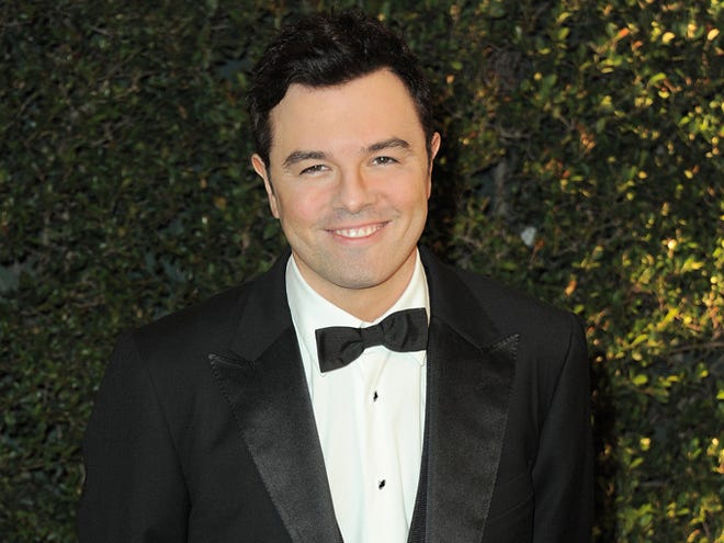 Seth MacFarlane appears at the 4th Annual Governors Awards on Dec. 1, 2012, in Los Angeles. Academy officials say Oscar host MacFarlane will join actress Emma Stone to reveal the nominees for the 85th annual Academy Awards. This is the first time since 1972 that an Oscar host has participated in the nominations announcement.