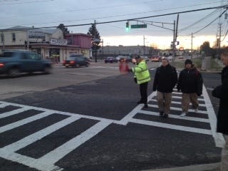 John Luff, crossing guard for Burlington City, at his post on Route 130 north, listed as the most dangerous stretch of highway in New Jersey for pedestrian fatalities.